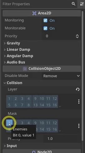 The Godot Inspector panel displays the Collision section with the Layer and Mask bitmask grids used to configure which physics layers the Area2D belongs to and which it can detect.
