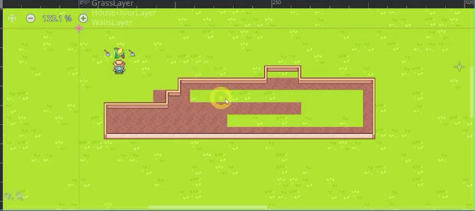 The finished house with floor tiles drawn beneath the walls and a character standing nearby.