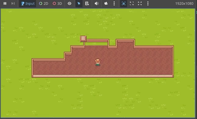 Godot game viewport showing a brick wall structure on grass being expanded tile by tile.